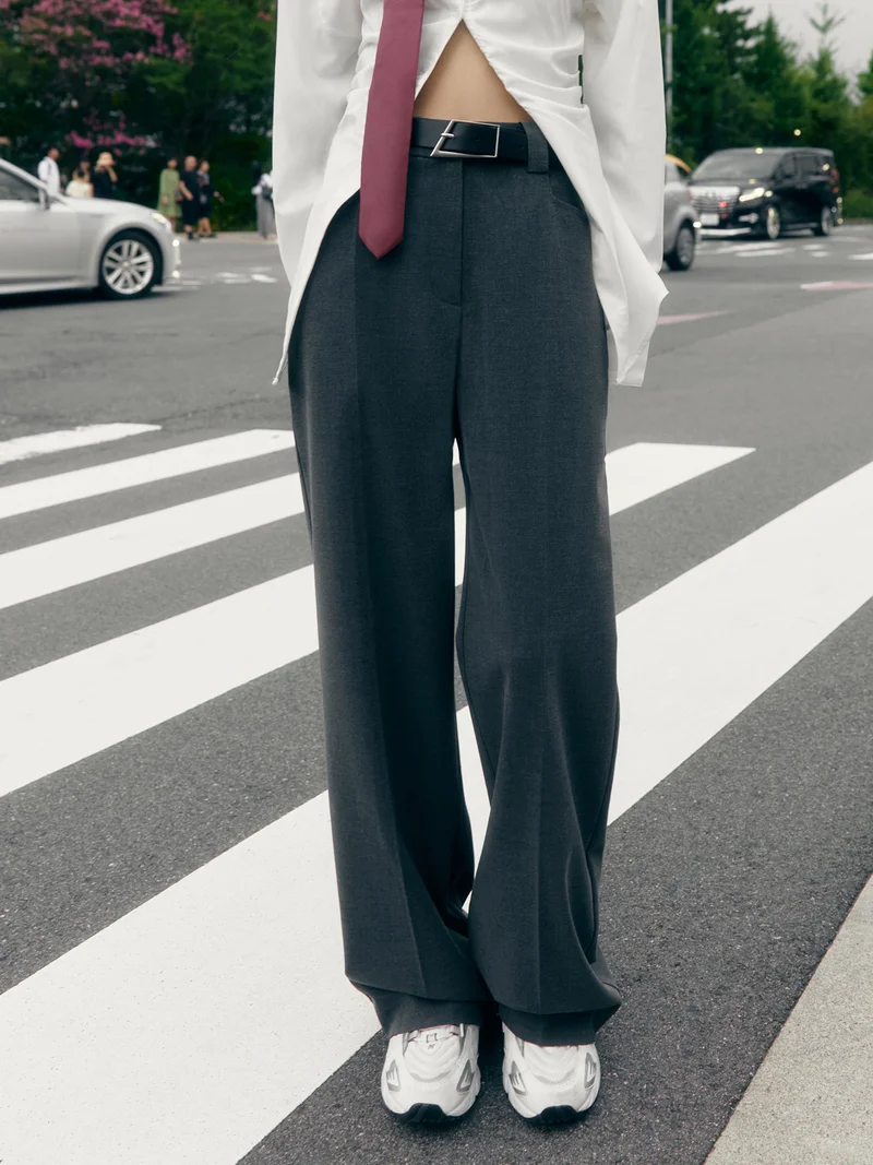 Lichi Straight suiting trousers with stitched creases and a belt