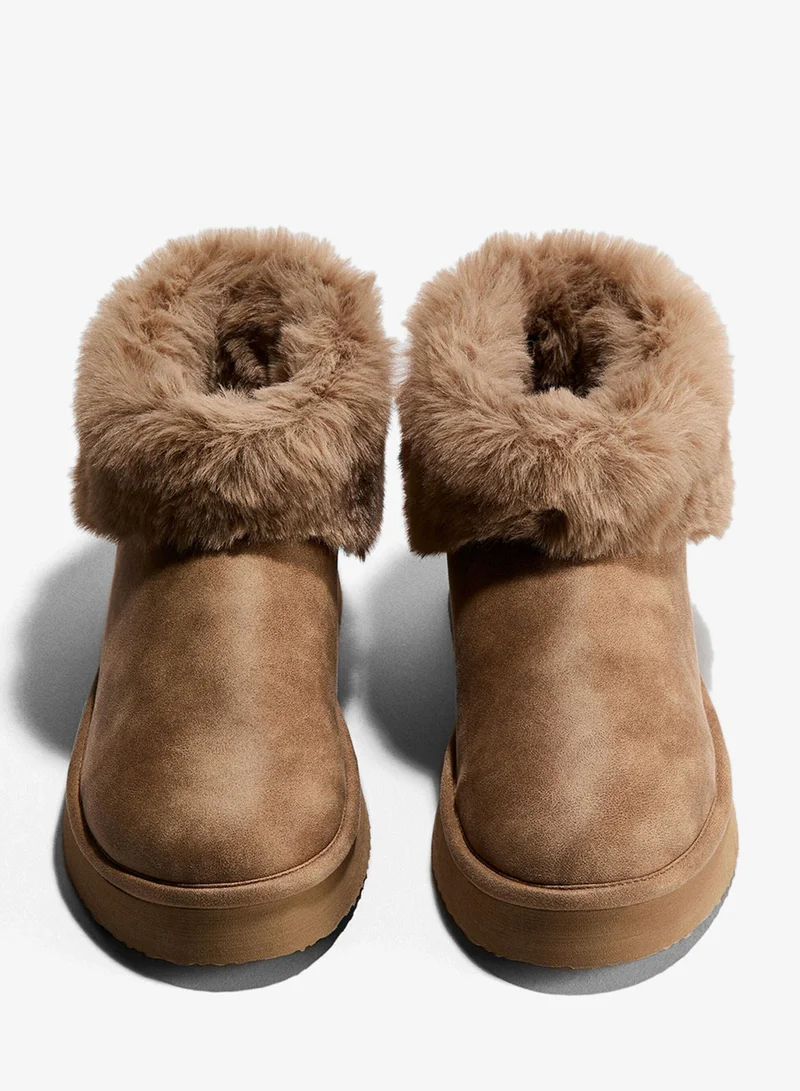 اتش اند ام بوت مبطن يمنح الدفء