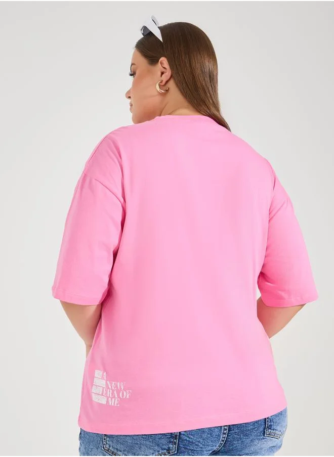 Styli Plus Size Distressed Slogan Print Round Neck Short Sleeve Oversized T-shirt