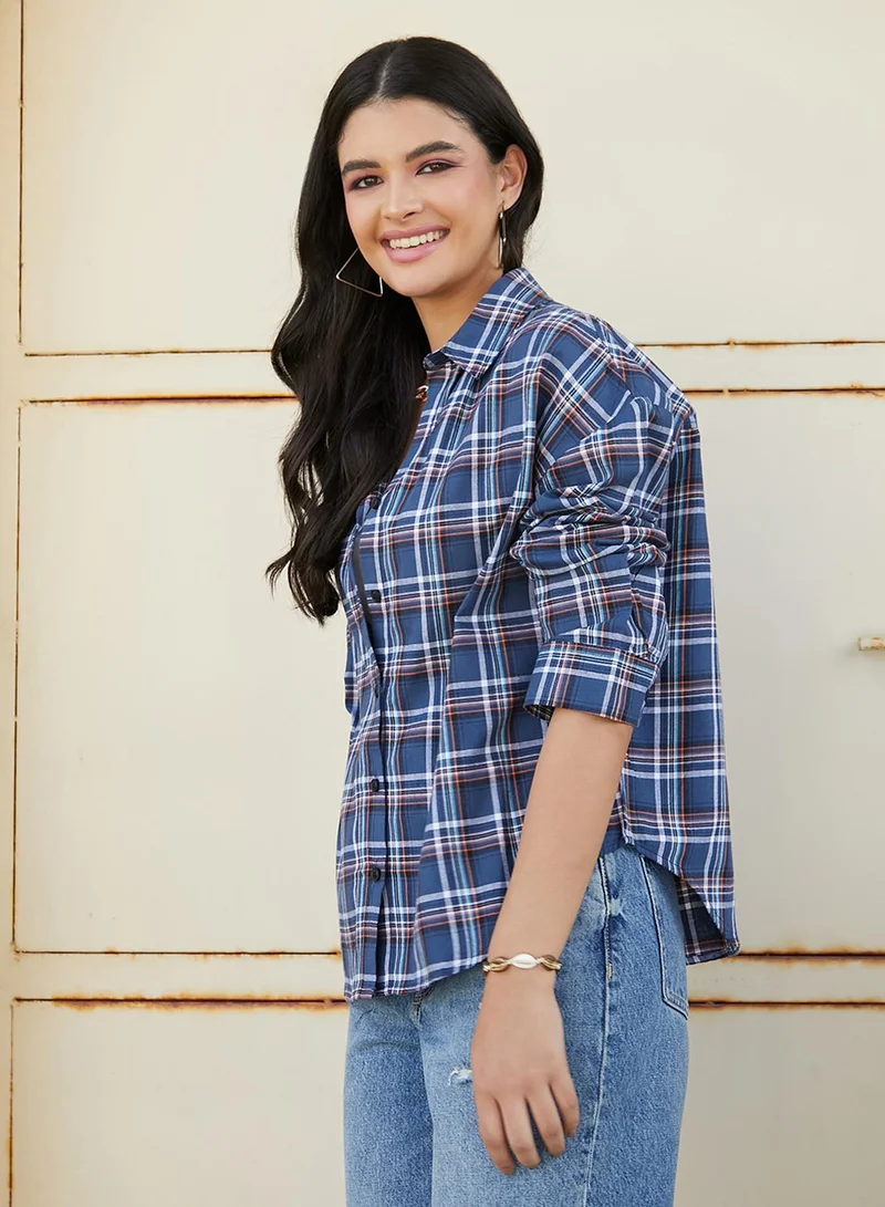 Campus Sutra Campus Sutra Women's Navy Blue Tartan Plaid Oversized Shirt For Casual Wear | Spread Collar | Short Sleeve | Button Closure | Oversized Shirt Crafted With Comfort Fit For Everyday Wear
