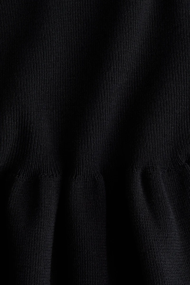 H&M Knitted peplum top