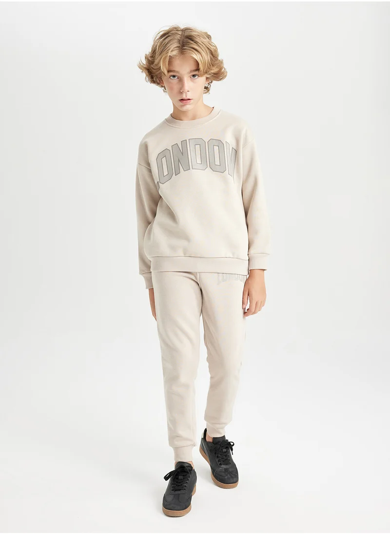 ديفاكتو Printed Elasticated Cuffed Jogger School Pants With Pockets