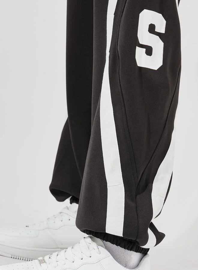 ستايلي Premium Scuba Knit Oversized Joggers with Cut & Sew Contrast Tape