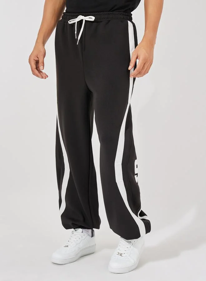 ستايلي Premium Scuba Knit Oversized Joggers with Cut & Sew Contrast Tape