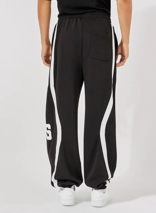 ستايلي Premium Scuba Knit Oversized Joggers with Cut & Sew Contrast Tape