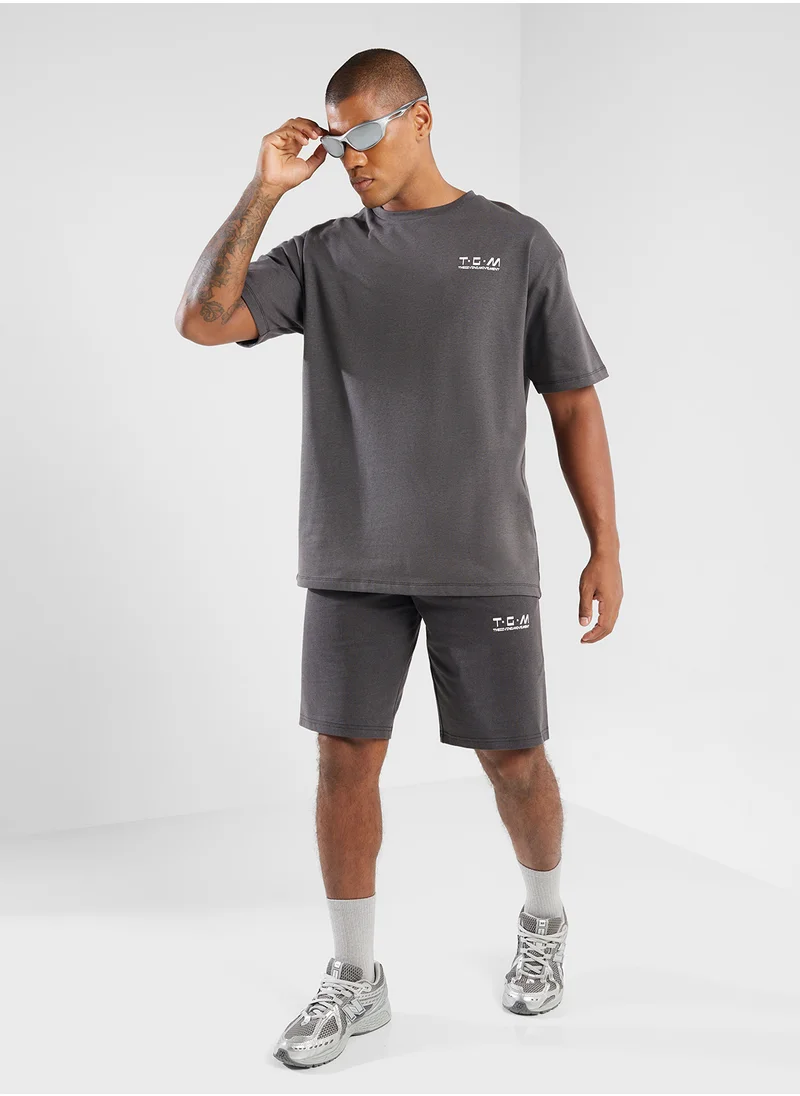 ذا جيفينج موفمنت Oversized Logo T-Shirt
