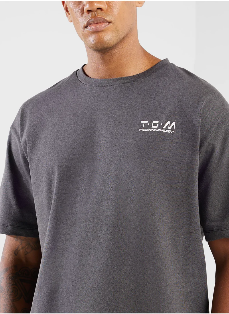 ذا جيفينج موفمنت Oversized Logo T-Shirt
