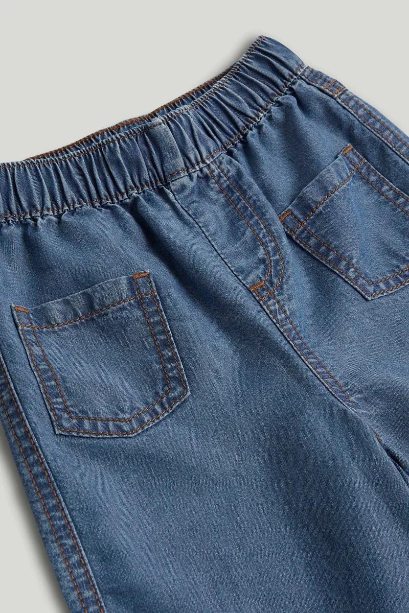 مذركير جينز دينم بساق واسعة