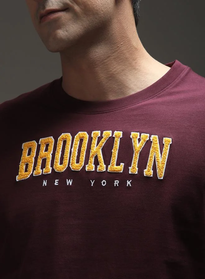 ديلينجر تيشيرت مطبع بأكمام قصيرة وقصة واسعة للرجال