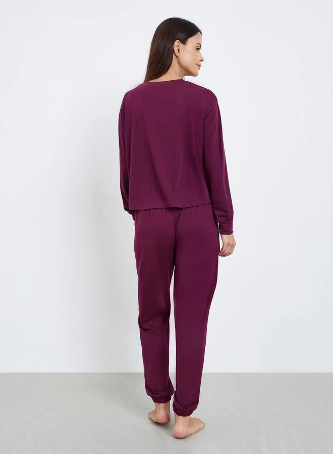Styli Burgundy Solid Drop Shoulder Long Sleeve Top and Cuffed Pyjama Set for Women | Best Price UAE