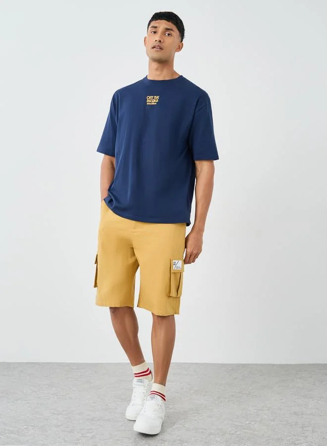 ستايلي Styli Men Navy Blue Graphic Print Short Sleeve Oversized T-Shirt