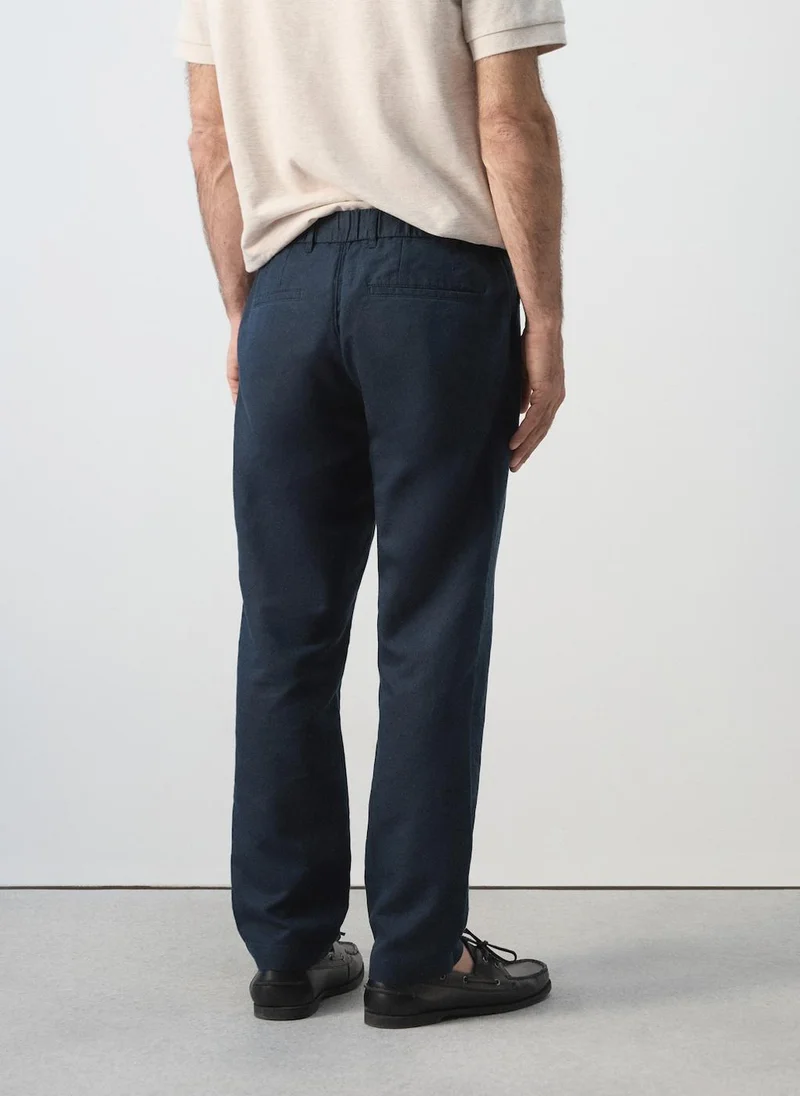 مانجو مان Slim Fit Cropped Linen-Cotton Trousers