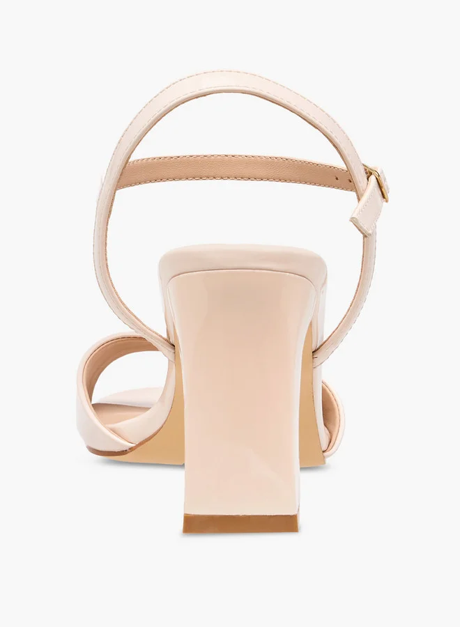 فلورا بيلا من شو إكسبرس Solid Block Heel Sandals with Buckle Closure