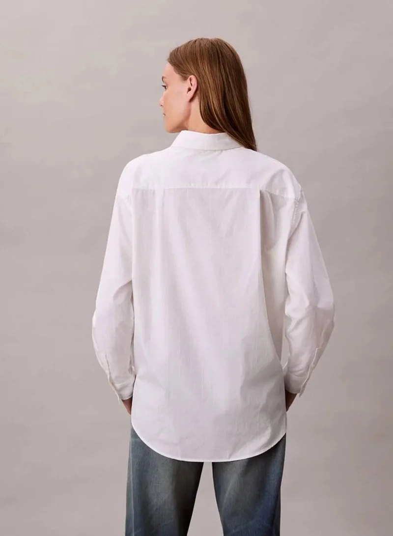 Calvin Klein Jeans Brilliant White Emblem Logo Button-Down Shirt for Women | Best Price UAE