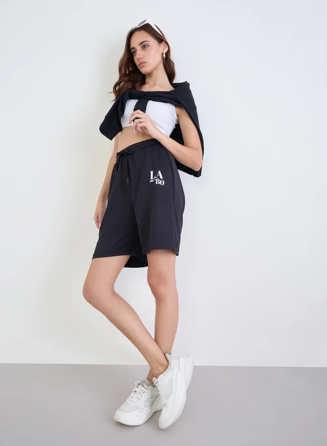 Styli Women Navy Graphic Print Oversized Shorts