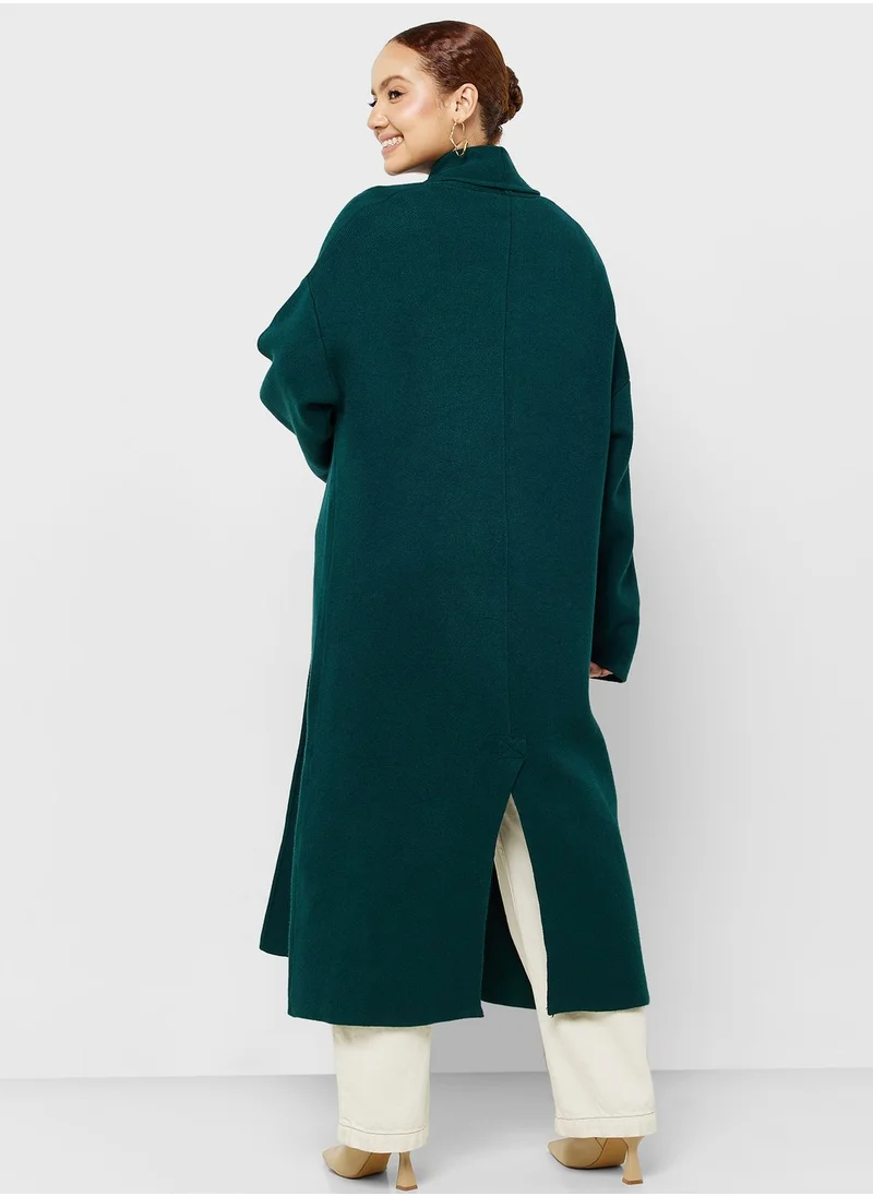 MANGO Oversized knitted coat with pockets