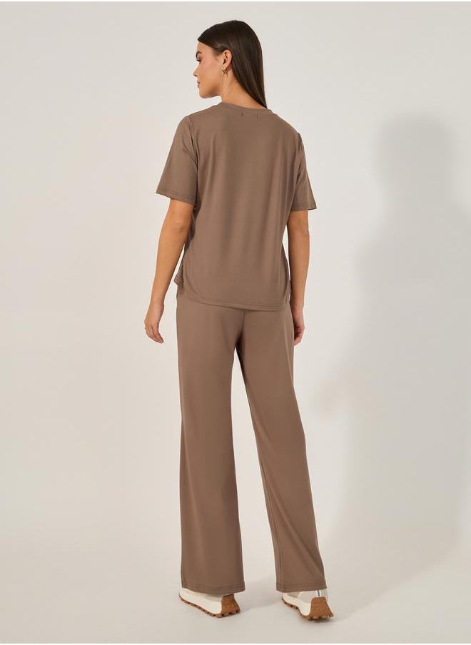 Styli - Solid Wide Leg Pants and Round Neck T-Shirt Set - Image 1