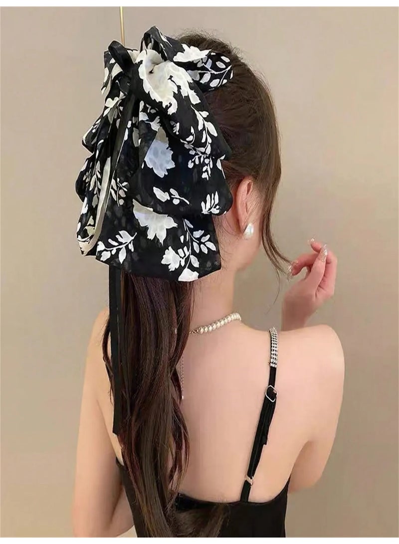 Large Bow Hair Clip with Elegant Black and White Floral Pattern — Adds a Feminine and Sophisticated Touch to Your Hairstyle - Image 1