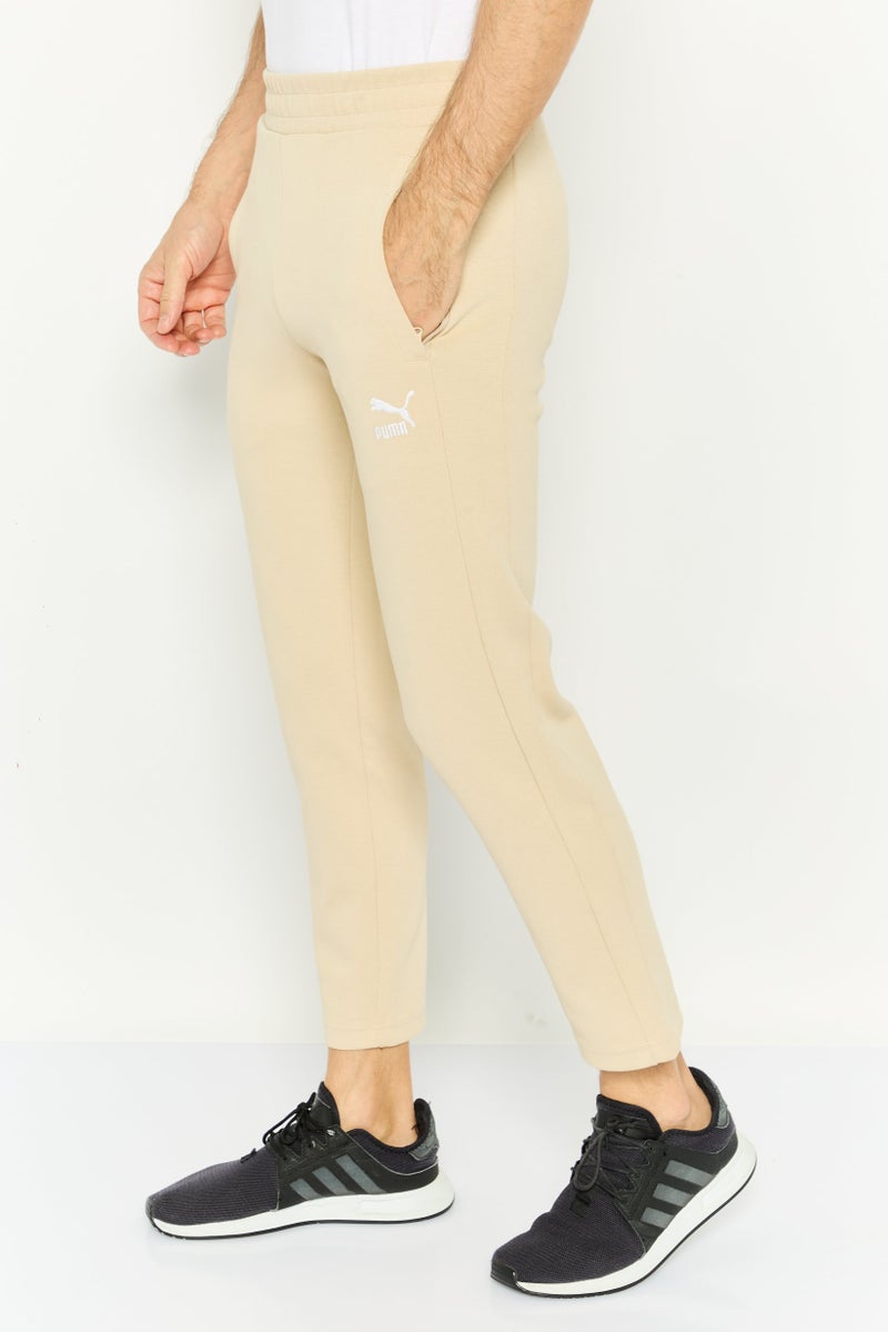 PUMA Men Sportswear Fit Embroidered Logo Outdoor Sweatpants, Beige  - Image 3