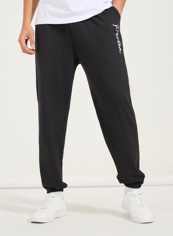 Styli Oversized Text Print Joggers - Image 1