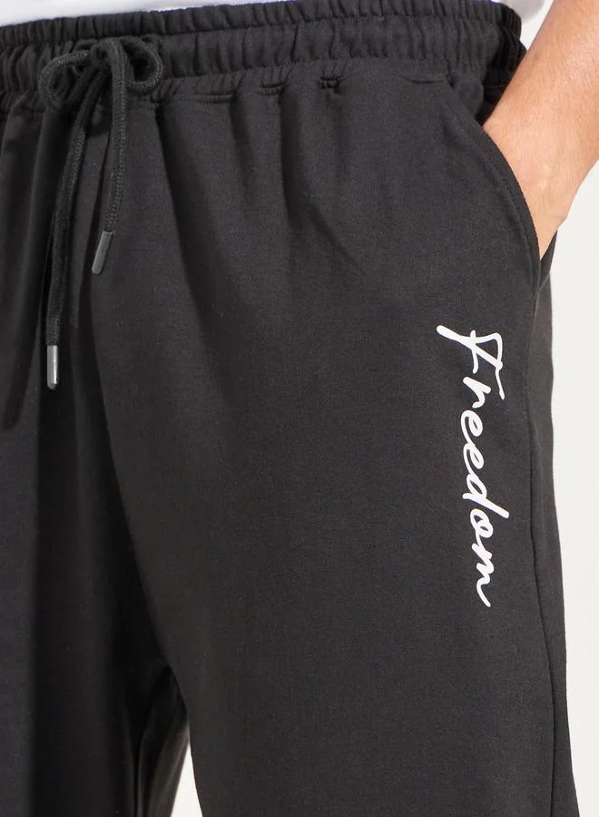 Styli Oversized Text Print Joggers