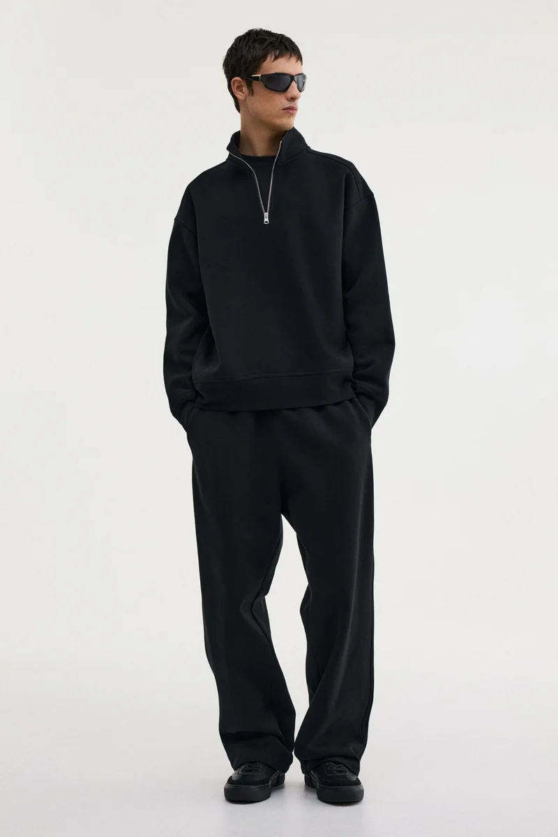 اتش اند ام سويت شيرت بقصّة واسعة مع سحاب