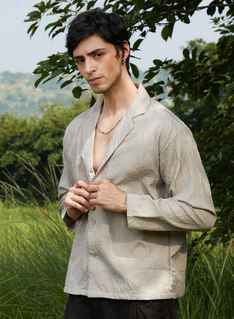 Campus Sutra Campus Sutra Men's Ecru Beige Wrinked Korean Oversized Shirt For Casual Wear | Lapel Collar | Long Sleeve | Button Closure | Oversized Shirt Crafted With Comfort Fit For Everyday Wear