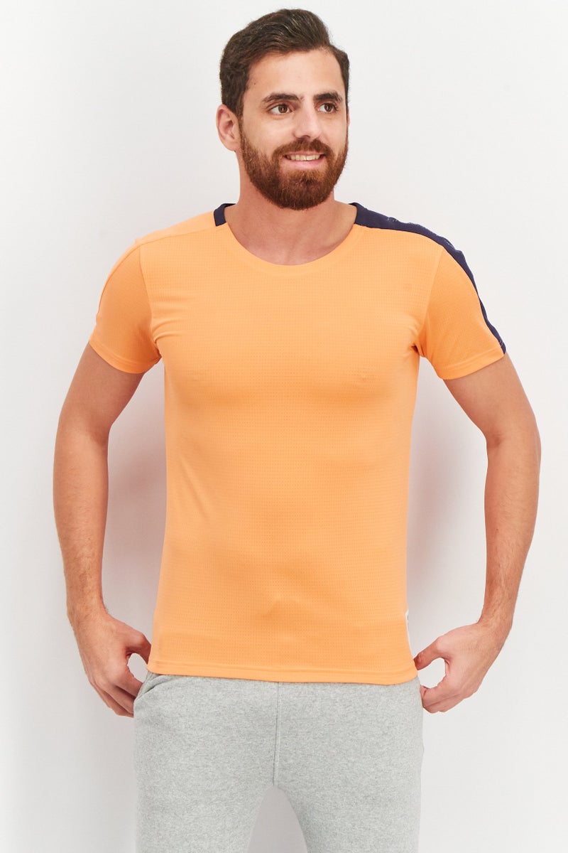 PUMA تي شيرت تدريب بومّا x فيرست مايل للرجال بقصة عادية بشعار العلامة التجارية، برتقالي - Image 1