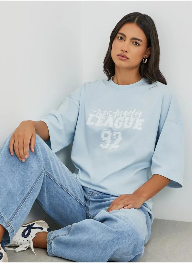 ستايلي Styli Slogan Print Exaggerated Shoulder Oversized T-Shirt