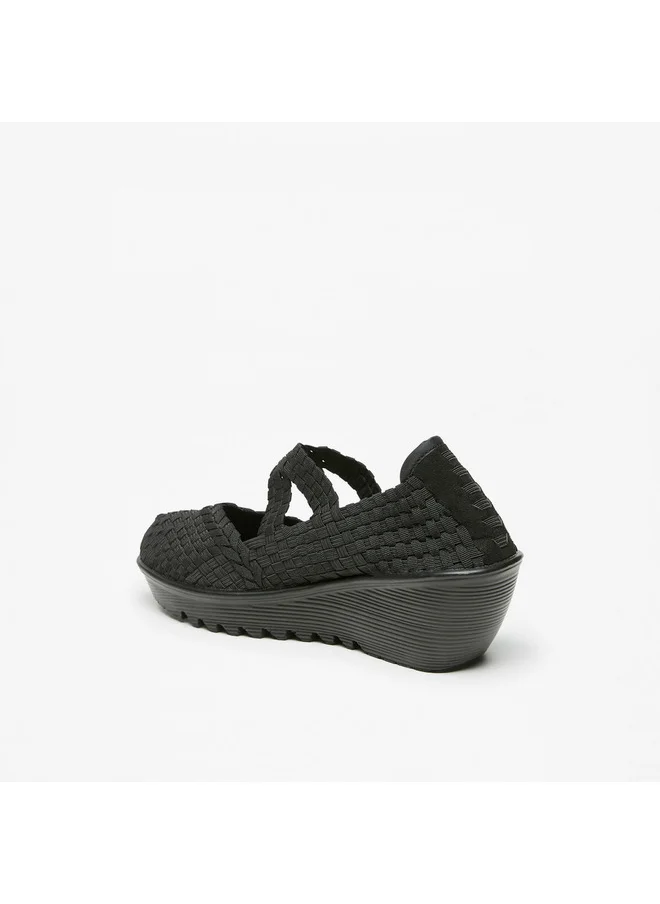 فلورا بيلا من شو إكسبرس Women's Textured Comfort Slip-On Shoes with Wedge Heels