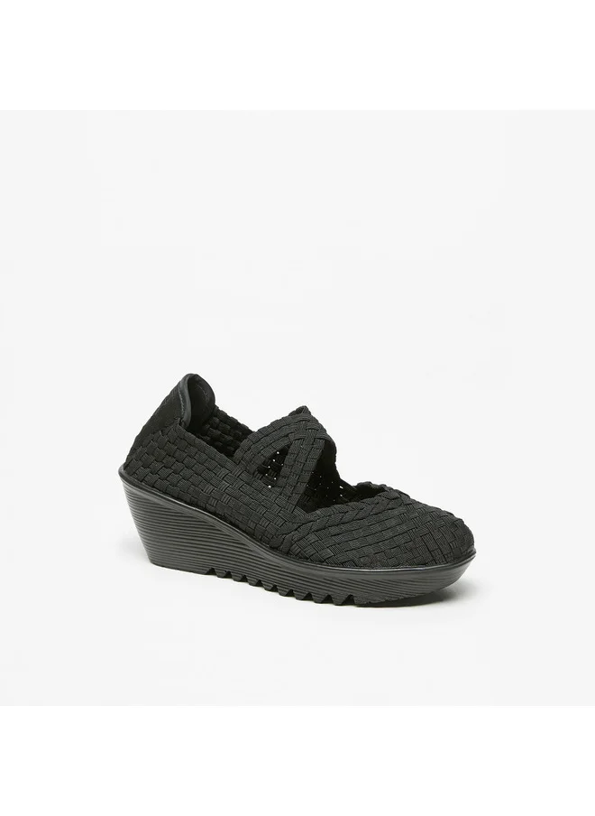 فلورا بيلا من شو إكسبرس Women's Textured Comfort Slip-On Shoes with Wedge Heels