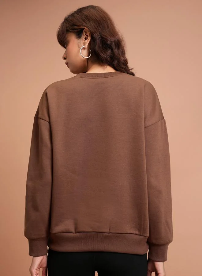Tokyo Talkies Graphic Print Oversized Sweatshirt by Styli