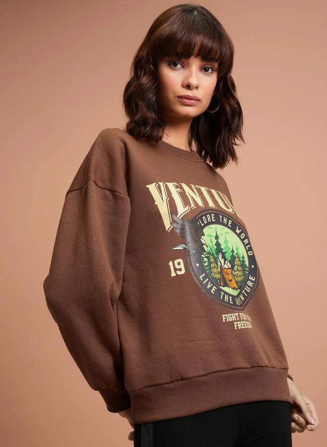 Tokyo Talkies Graphic Print Oversized Sweatshirt by Styli