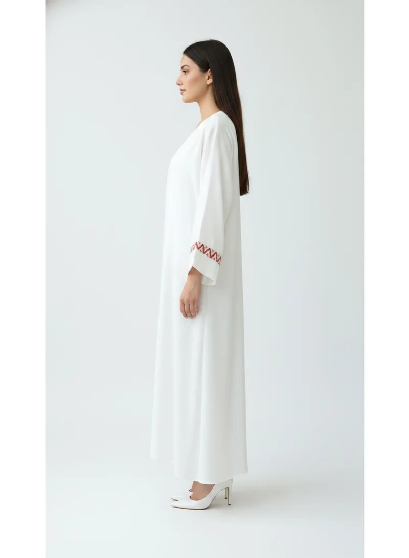 Moistreet Sophisticated Off-White Abaya Set Featuring Orange Patterned Lace Cuffs