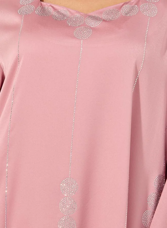 ستايلي matte satin jalabiya with rhinestone pattern embellishment