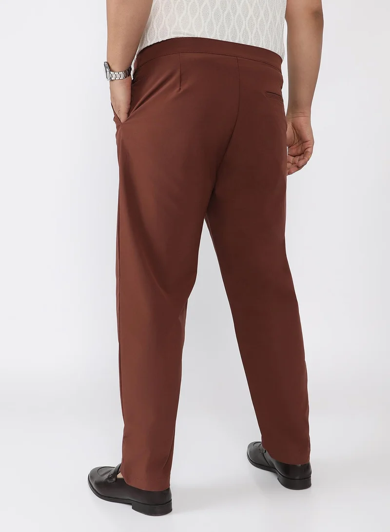 Campus Sutra  Men Pleated-Textured Tailored Trousers | Mid Rise , Side-Button Adjuster | Button Closure , Straight Hem | Solid Textured | Woven Fabric For Casual & Evening Wear | Teddy Brown for Men | Best Price UAE