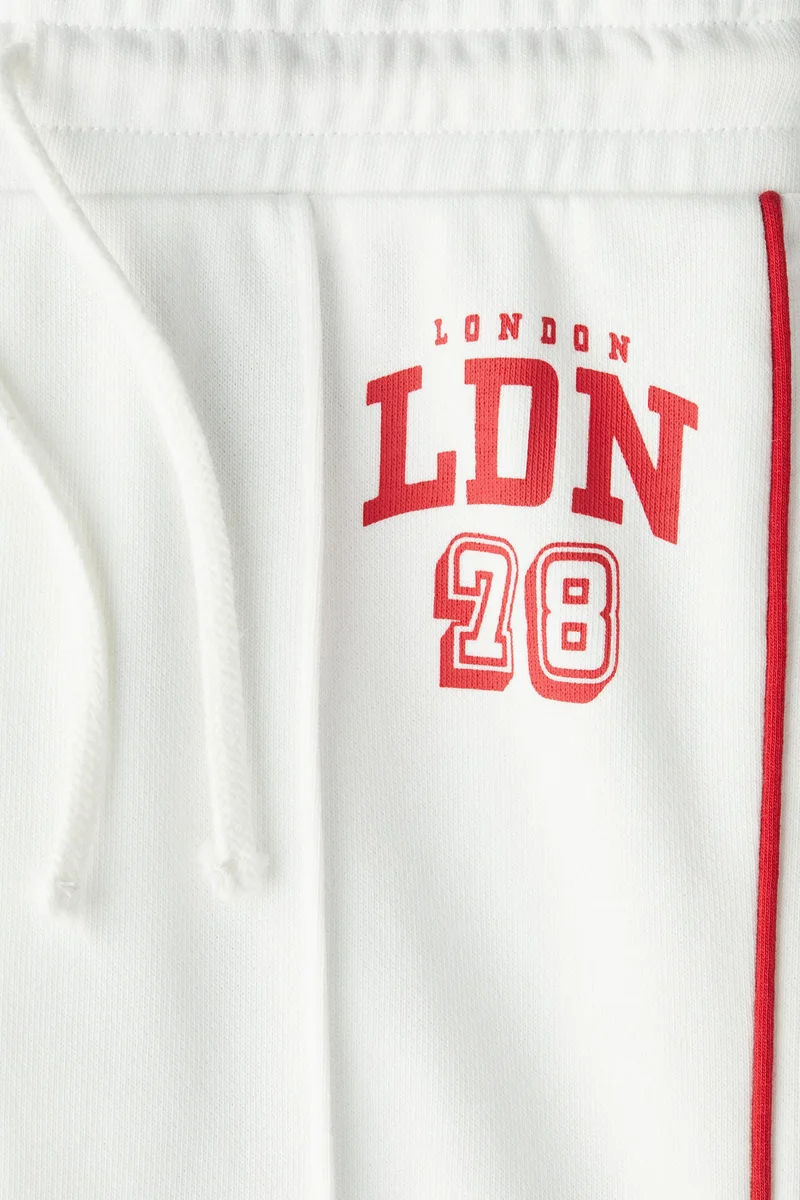 اتش اند ام بنطلون رياضي بحافة واسعة وثنية