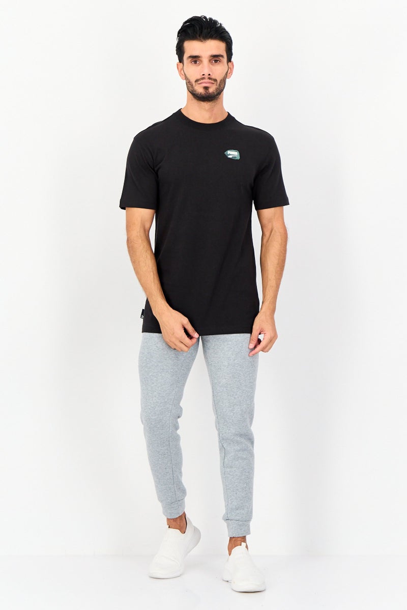 PUMA تي شيرت رجالي بقصة مريحة بأكمام قصيرة، أسود - Image 4