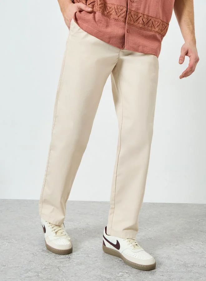 Styli  Men Beige Cotton Relaxed Fit Pants for Men | Best Price UAE
