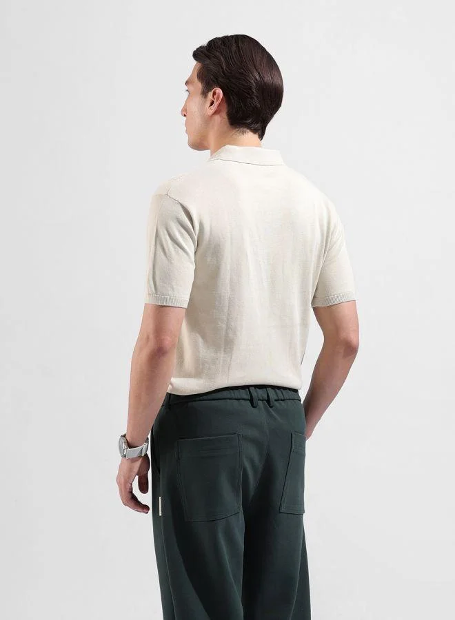 شركة المرآب الهندية Men Slim Fit Textured Polo Neck Half Sleeves T-Shirt