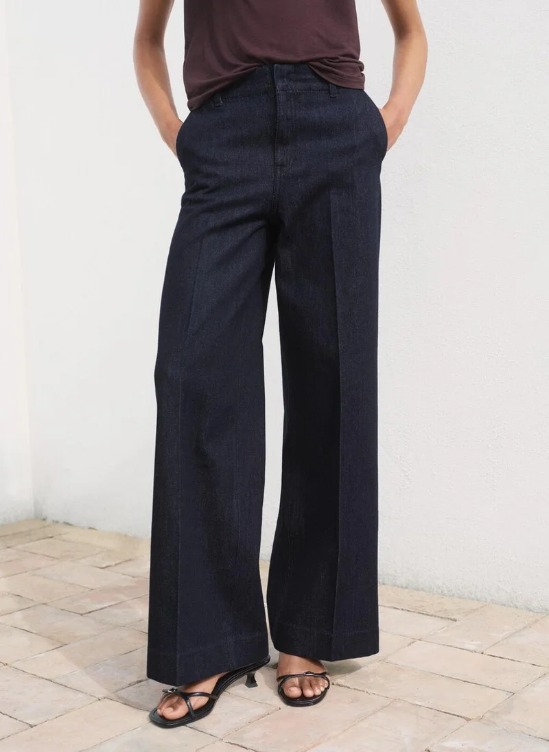 MANGO High-waisted wideleg denim trousers
