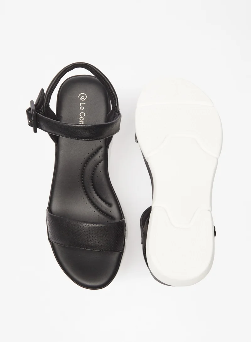 Le Confort Textured Sandals With Buckle Closure And Wedge Heels