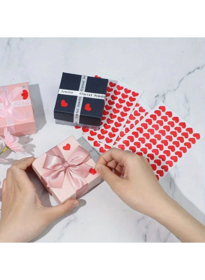 Red Heart Design Stickers – Set of 300 Pieces Stickers with a red heart design, a set of 300 pieces, suitable for decorating gifts, cards, favor boxes, and can be applied on paper, cardboard, glass, plastic, and metal surfaces. - Image 3