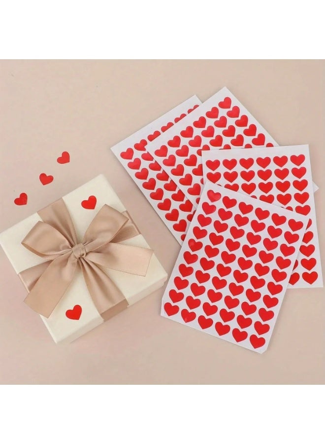 Red Heart Design Stickers – Set of 300 Pieces Stickers with a red heart design, a set of 300 pieces, suitable for decorating gifts, cards, favor boxes, and can be applied on paper, cardboard, glass, plastic, and metal surfaces. - Image 1