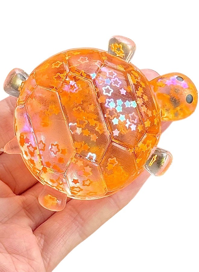 Orange Transparent Turtle Squishy Squeeze Toy, Star Filled Fidget Ball for Sensory Play - Image 1