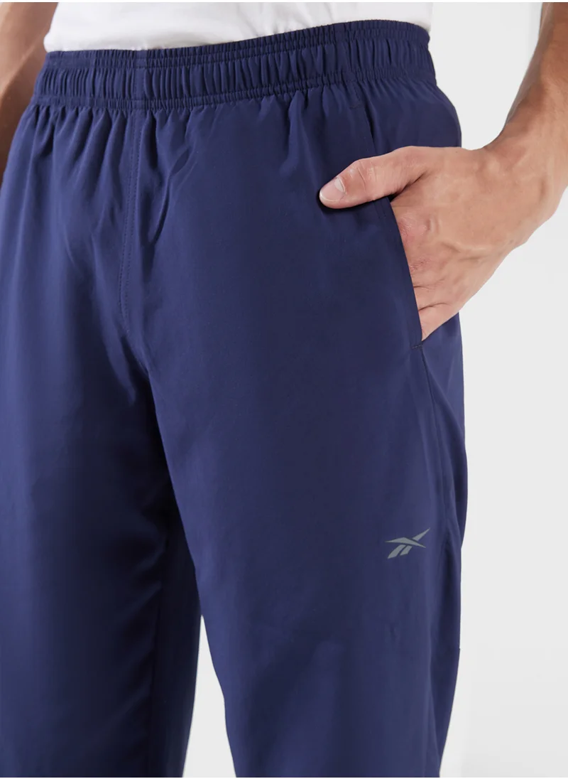 ريبوك Identity Train Woven Unlined Sweatpants