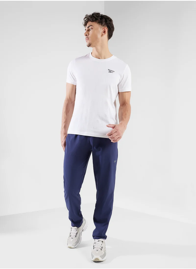 ريبوك Identity Train Woven Unlined Sweatpants