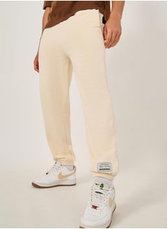 Styli Mid Rise Relaxed Fit Joggers with Badge Detail  - Image 1