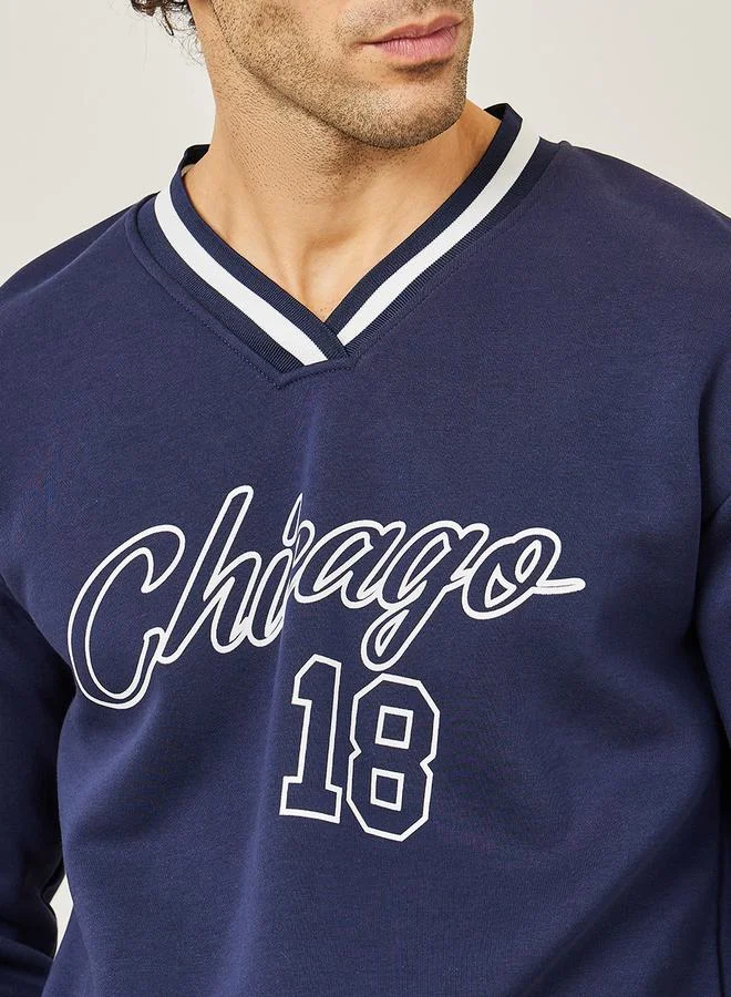 Styli Graphic Print V Neck Ribbed Varsity Sweatshirt