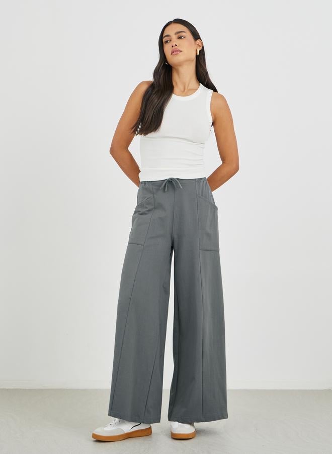 Styli Styli Solid Cut and Sew Wide Leg Joggers - Image 1